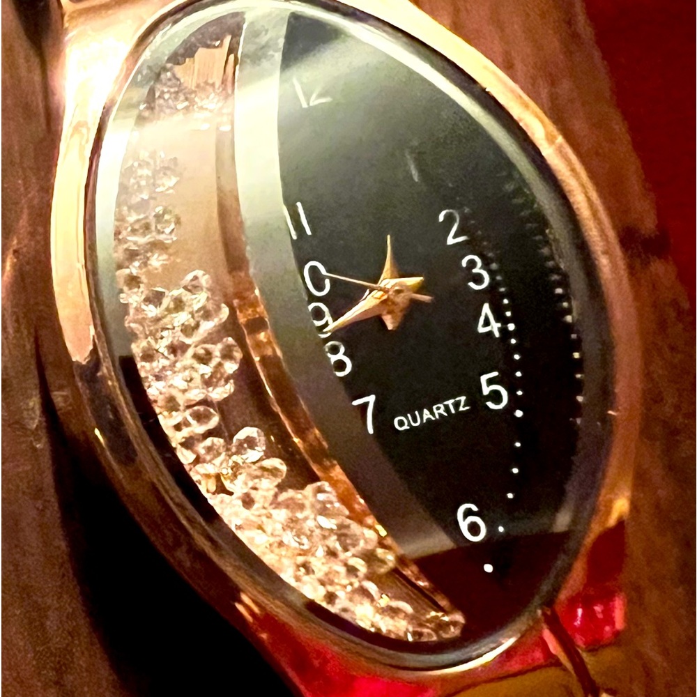 fashion watch with cz floating inside watch face ,‎ very beautiful